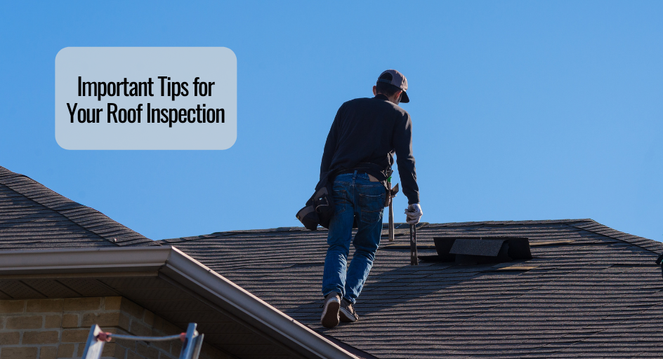 image of a roofing contractor walking on a roof performing an inspection
